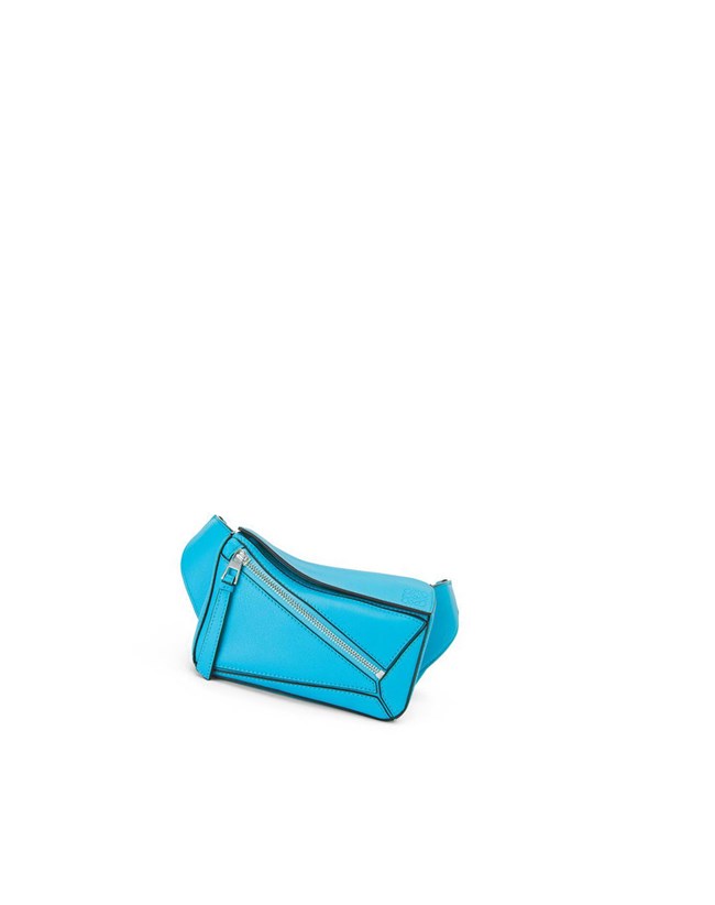 Loewe Mini Puzzle bumbag in classic calfskin Cyan | JC4923568