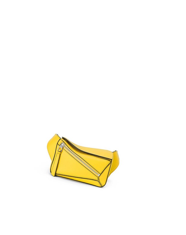 Loewe Mini Puzzle bumbag in classic calfskin Lemon | SK6213790