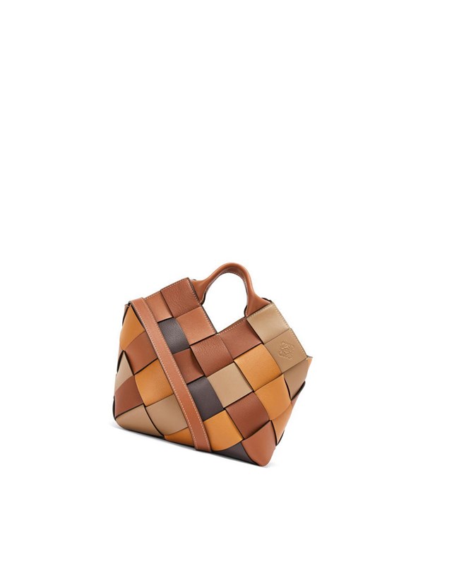 Loewe Small Surplus Leather Woven basket bag in calfskin Brown / Brown | HX8720591